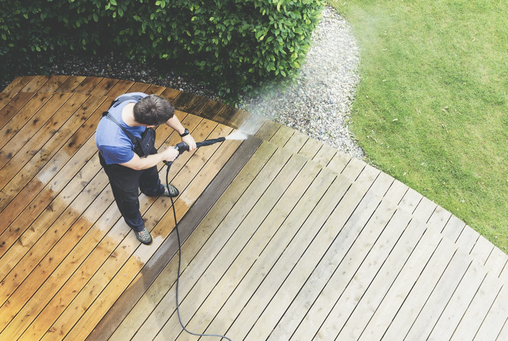 progress photo of a persons pressure wash services in action